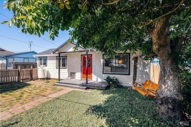 view of front of property with a front lawn