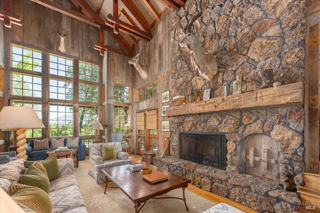 living room with high vaulted ceiling, a fireplace, beamed ceiling, and wood-type flooring