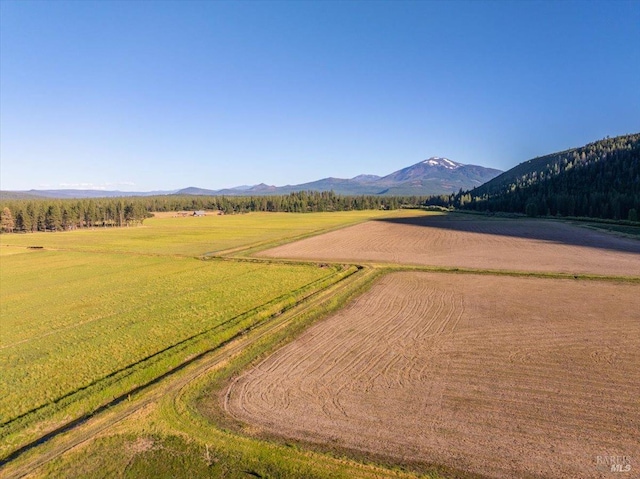 view of mountain feature with a rural view