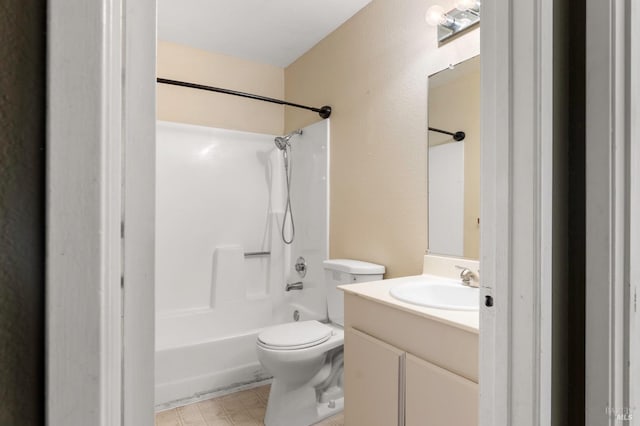 full bathroom featuring vanity, bathing tub / shower combination, and toilet