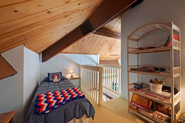 carpeted bedroom featuring lofted ceiling with beams and wooden ceiling