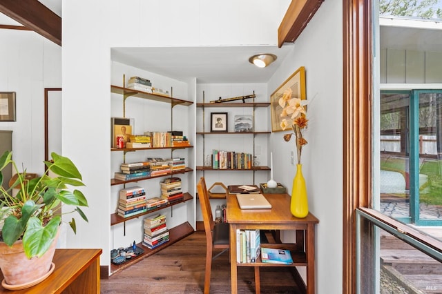 office space featuring beamed ceiling and hardwood / wood-style floors