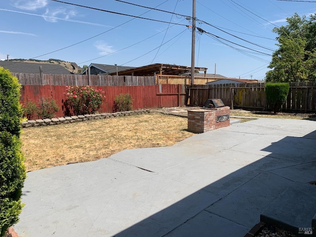 view of patio with area for grilling