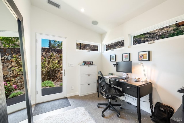 office space with vaulted ceiling