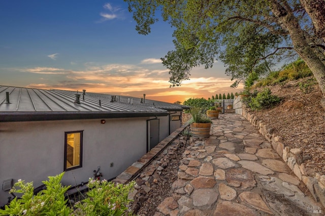 view of property exterior at dusk