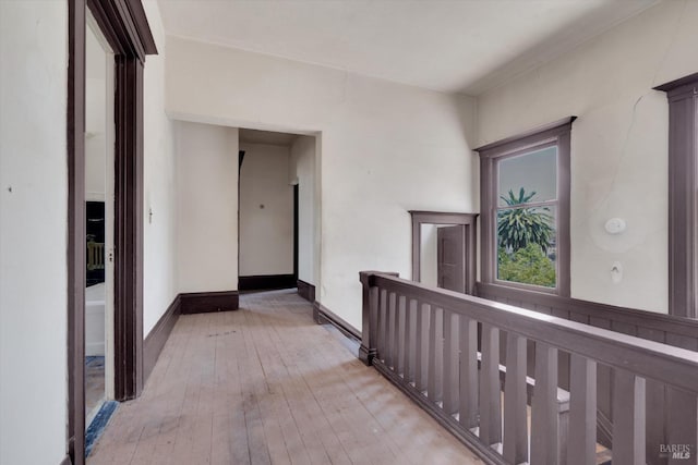 corridor featuring light hardwood / wood-style flooring