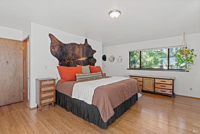 bedroom featuring wood-type flooring