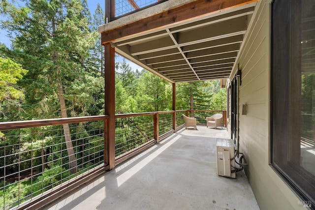 view of patio / terrace with a balcony