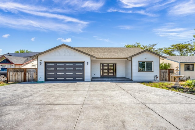 ranch-style house featuring a garage