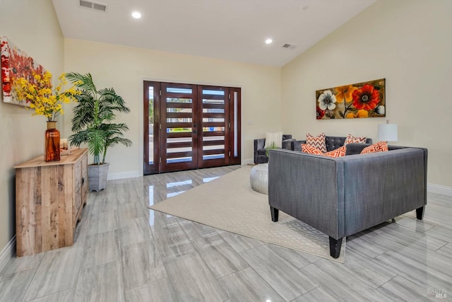 living room with lofted ceiling