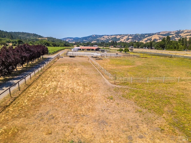 aerial view with a mountain view and a rural view