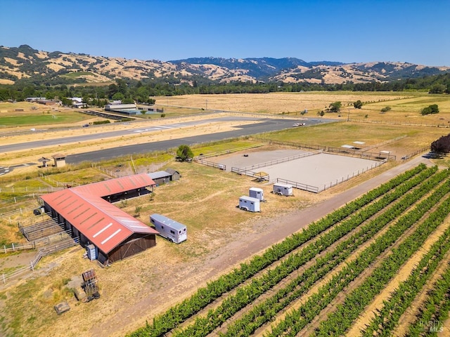 bird's eye view with a mountain view and a rural view