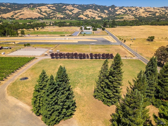 aerial view with a mountain view and a rural view