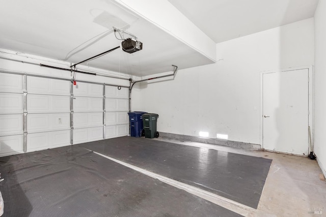 garage featuring a garage door opener