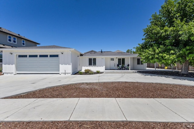 single story home with a garage