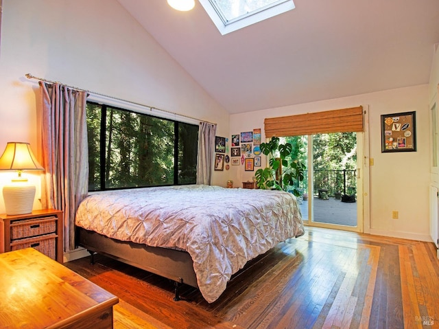 bedroom featuring access to outside, a skylight, high vaulted ceiling, and wood-type flooring