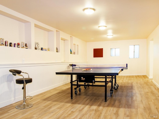 game room with hardwood / wood-style floors