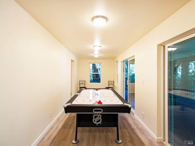 game room featuring hardwood / wood-style floors