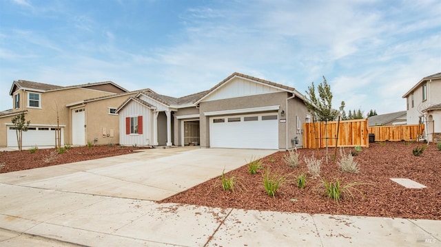 ranch-style house featuring a garage