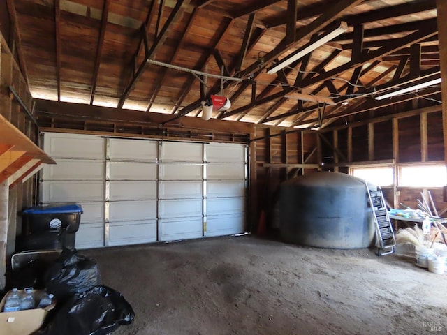 garage featuring wooden ceiling