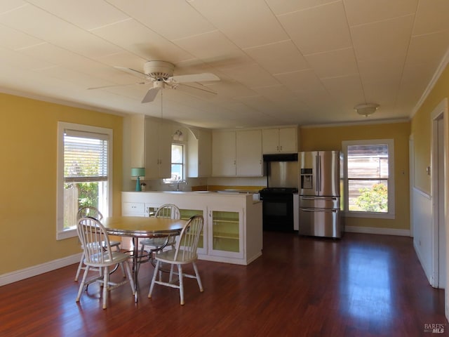 kitchen with black range with electric stovetop, white cabinetry, dark wood-type flooring, stainless steel refrigerator with ice dispenser, and kitchen peninsula