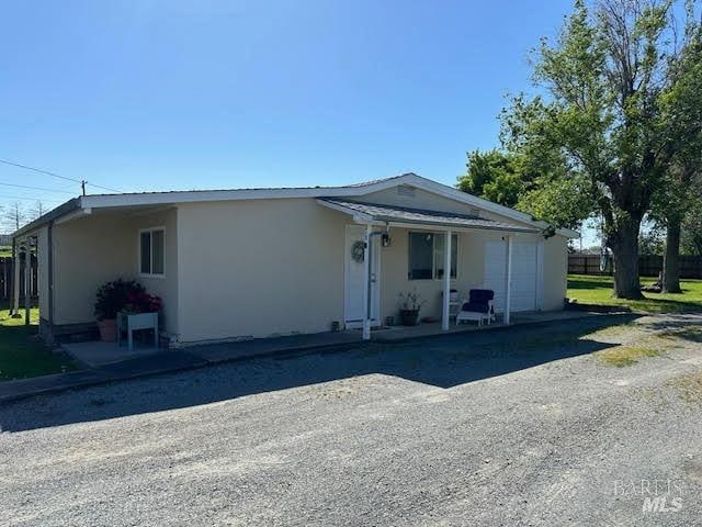 view of front of home featuring stucco siding