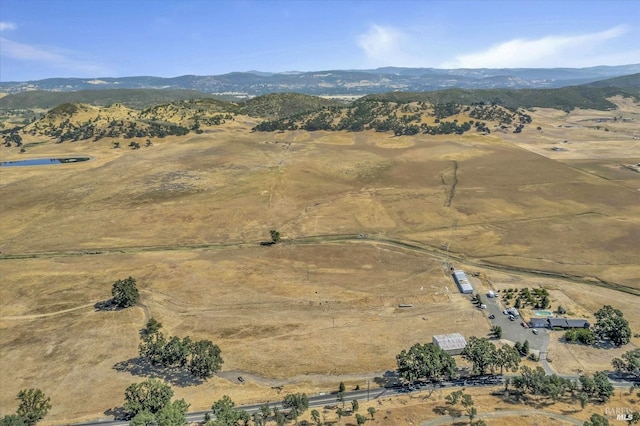 aerial view featuring a mountain view and a rural view