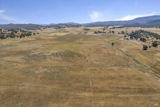 aerial view with a mountain view and a rural view