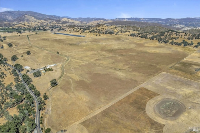 aerial view with a mountain view and a rural view