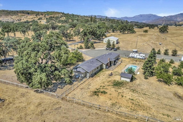 bird's eye view featuring a mountain view and a rural view