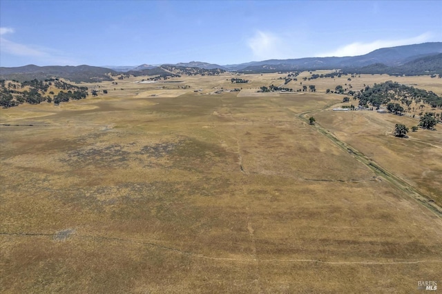 aerial view with a mountain view and a rural view