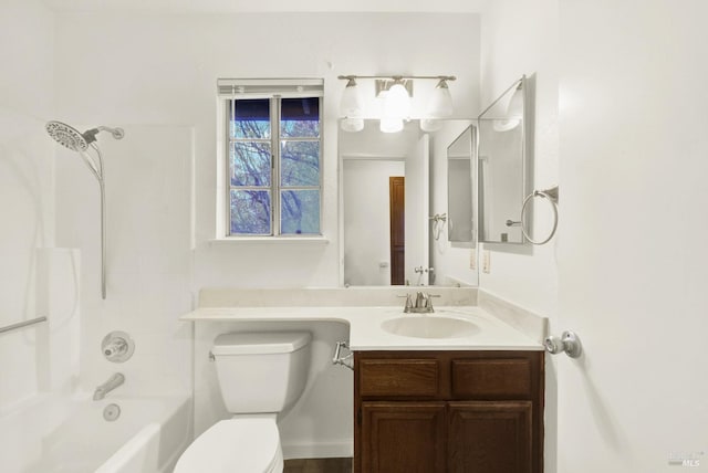 full bathroom with toilet, vanity, and tub / shower combination