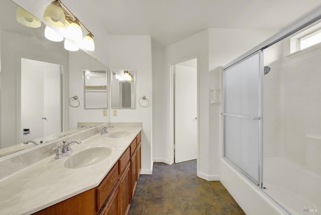 bathroom with vanity and enclosed tub / shower combo