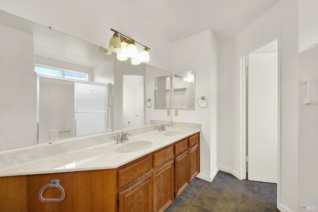 bathroom featuring vanity and a shower with shower door