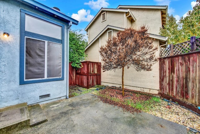 view of home's exterior featuring a patio