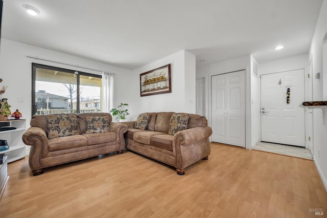 living room with light wood-type flooring