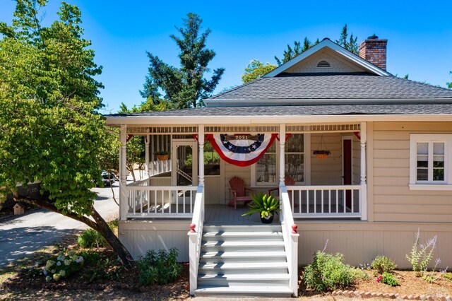 view of front of home featuring covered porch