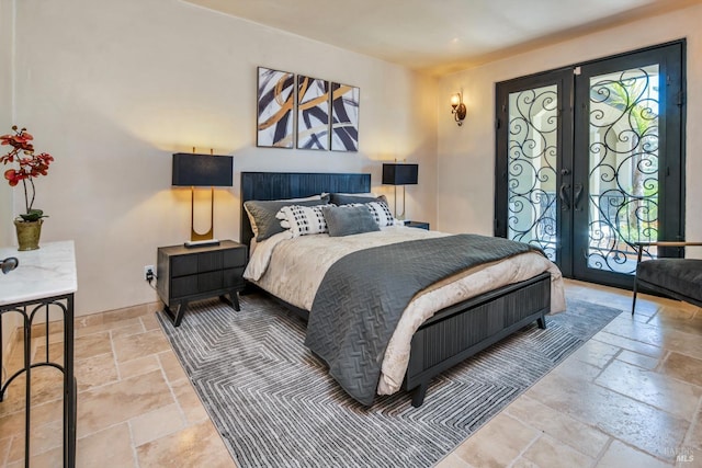 bedroom featuring french doors and multiple windows