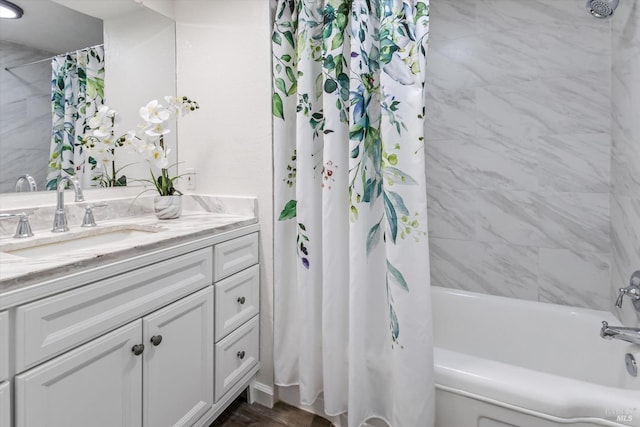 bathroom with vanity and shower / bathtub combination with curtain