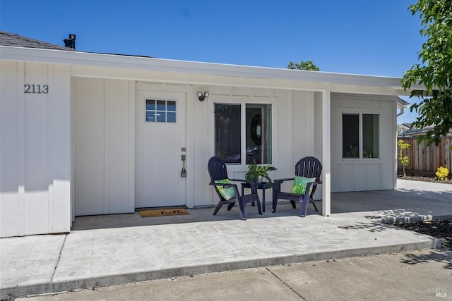 property entrance featuring a patio