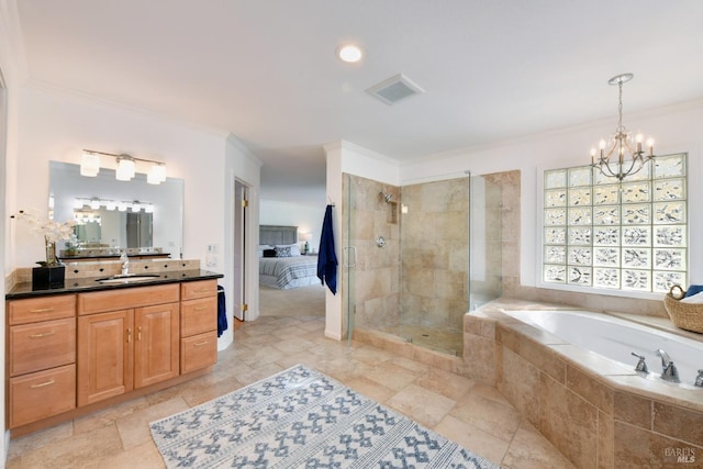 bathroom with vanity, crown molding, independent shower and bath, and a chandelier