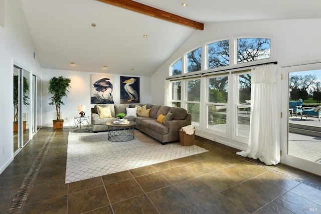 living room featuring high vaulted ceiling and beamed ceiling