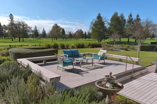 wooden deck with an outdoor living space and a yard