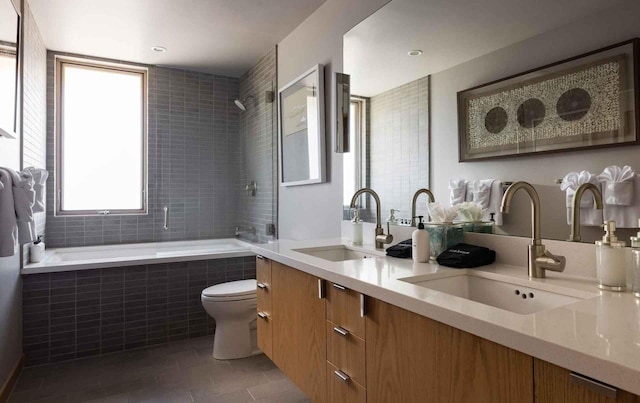 bathroom with vanity, tile patterned floors, and toilet