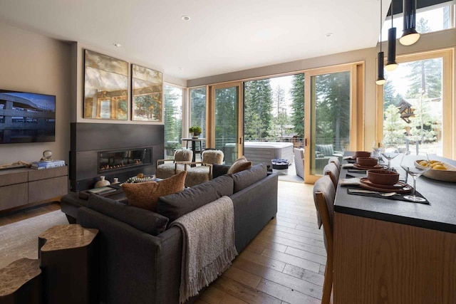 sunroom / solarium featuring plenty of natural light