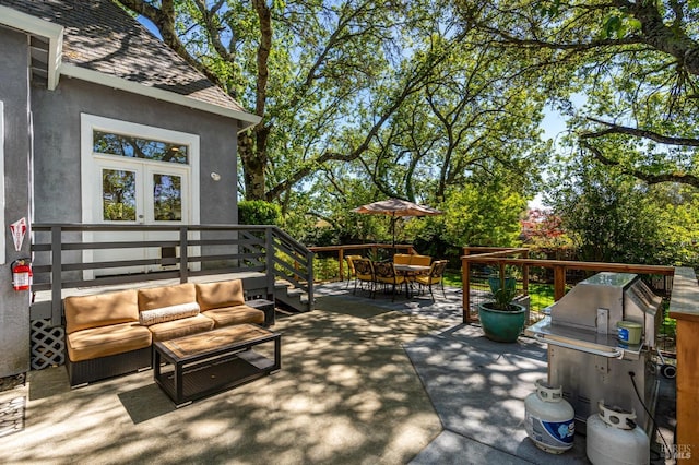 wooden terrace featuring an outdoor hangout area and outdoor dining space