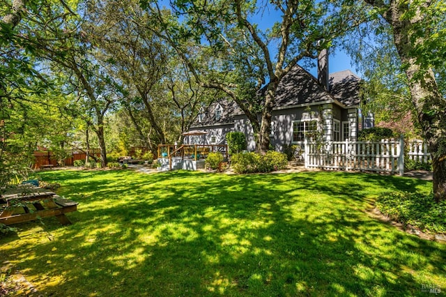 view of yard featuring fence