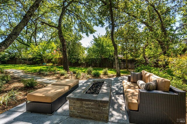 view of patio / terrace with a fire pit