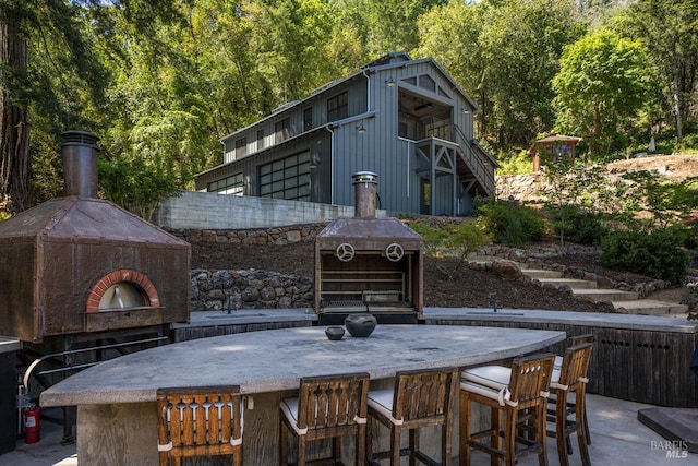 view of patio / terrace with a bar