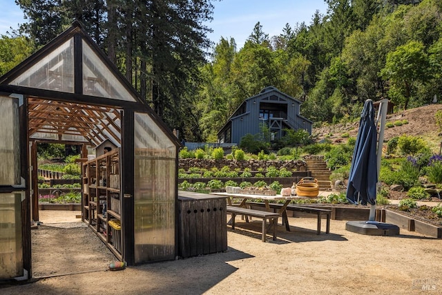 exterior space featuring an outbuilding